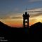 80  Il sole tramonta in Filaressa e dietro il campanile della chiesetta di San Barnaba.JPG