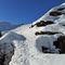 22 In decisa salita pestando neve alla Casera Alpe Aga.JPG