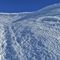 19 Calzando ramponi salgo la cresta sud_ovest su neve dura .JPG