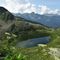 34 Lago di Valsambuzza _2085 m_  dall_alto con vista verso i monti dei Laghi Gemelli.JPG