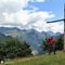 02 Alla rustica croce lignea  del Monte Colle _1750 m_ il panorama spazia sulle alte cime orobiche di Val Brembana.JPG