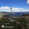 03 Alla croce di vetta dello Zucco Barbesino _1954 m_ con vista in Zuccone Campelli.jpg