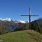 48 Alla croce del Monte Colle _1750 m_ con vista verso le alte Orobie Brembane.JPG
