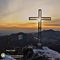 72 La bella croce di vetta Cornagera _1311 m_ baciata dal sole con vista verso la Val Serina.jpg