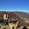30 Bella vista sulla conca di Zogno e verso la vicina cima del Canto Alto.jpg