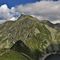 69 Vista panoramica da sopra il Passo di Valcervia verso Corno Stella a dx e Monte Toro a sx.jpg