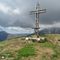53 Alla croce di vetta di Cima Grem _2049 m_ raggiunta numerose volte dal versante sud.JPG