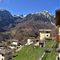 08 Da Grasso vista panoramica verso i monti Cornetta e Corna Grande.jpg