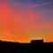 Il tramonto visto dalla finetra di casa a Pognano, con lo sky-line del cortile...